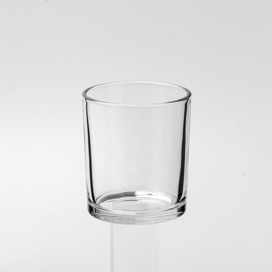 Clear glass on a white background with black curtains