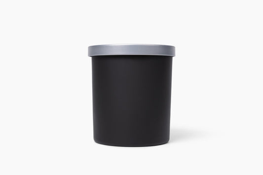 Aroma Crafters 8oz Classic custom candle in a matte black vessel with brushed silver lid, white background